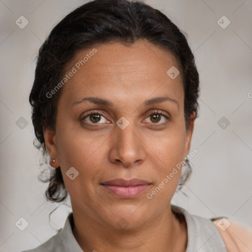 Joyful white adult female with short  brown hair and brown eyes