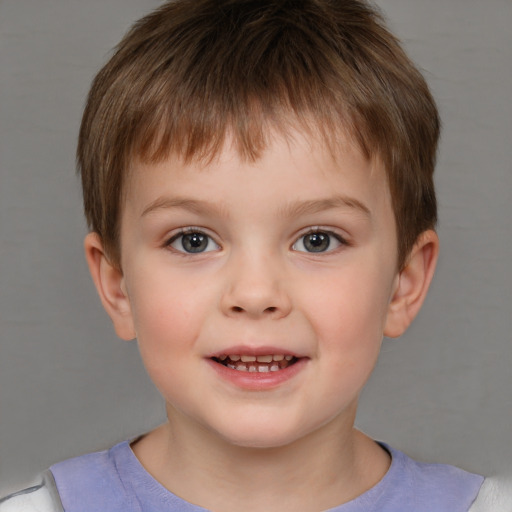 Joyful white child male with short  brown hair and brown eyes