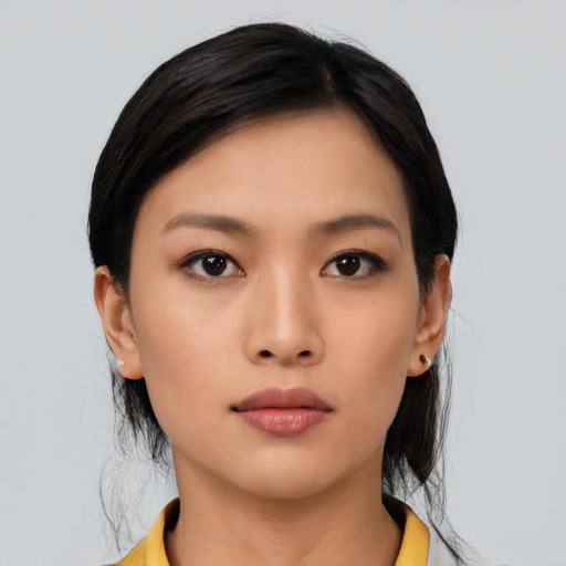 Neutral asian young-adult female with medium  black hair and brown eyes