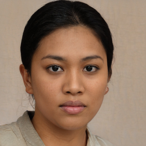 Neutral asian young-adult female with medium  brown hair and brown eyes
