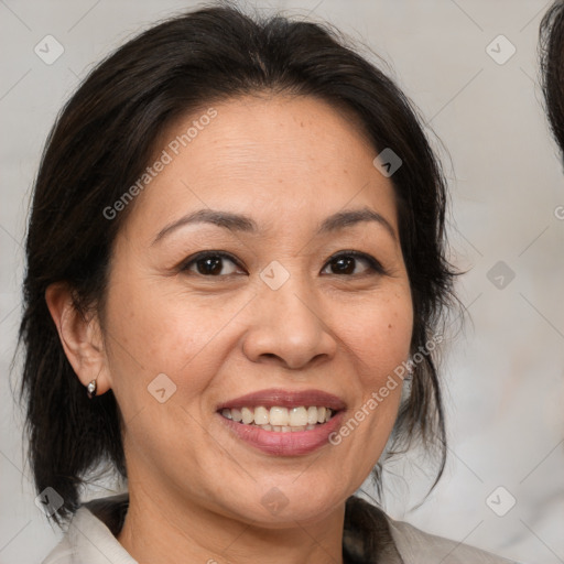 Joyful white adult female with medium  brown hair and brown eyes