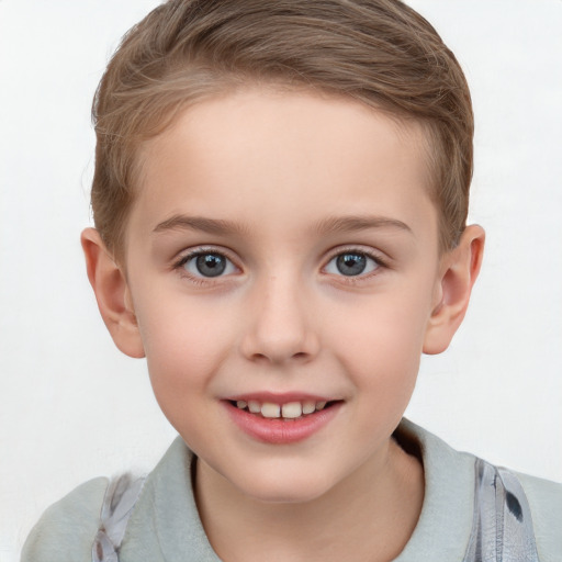 Joyful white child female with short  brown hair and grey eyes