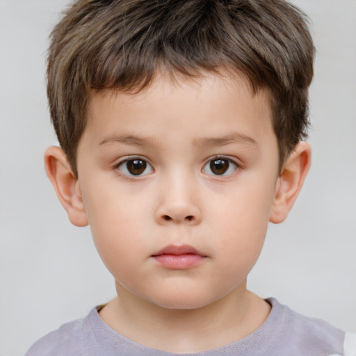 Neutral white child male with short  brown hair and brown eyes