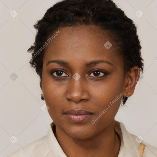 Neutral black young-adult female with short  brown hair and brown eyes