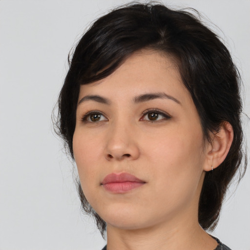 Neutral latino young-adult female with medium  black hair and brown eyes