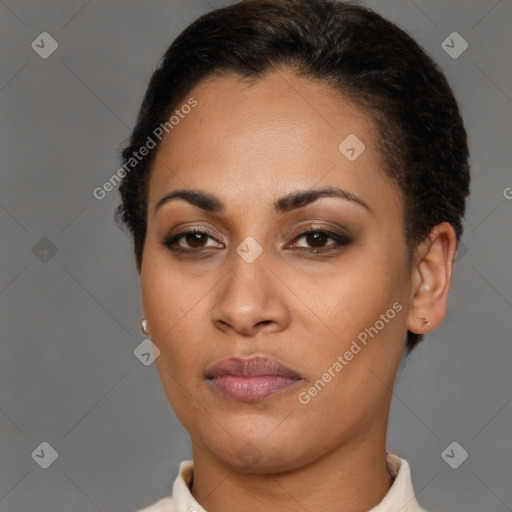 Joyful latino young-adult female with short  brown hair and brown eyes