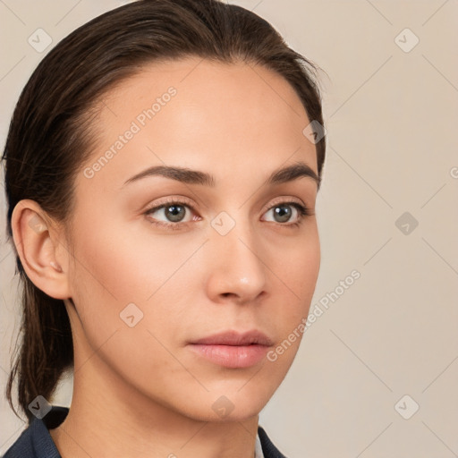 Neutral white young-adult female with medium  brown hair and brown eyes