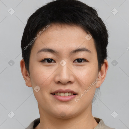 Joyful asian young-adult female with short  brown hair and brown eyes