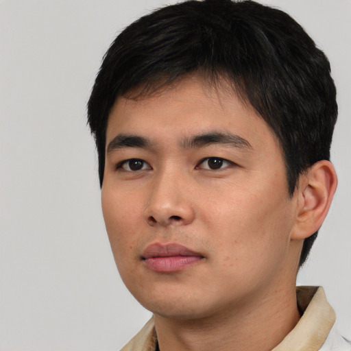 Neutral asian young-adult male with short  black hair and brown eyes