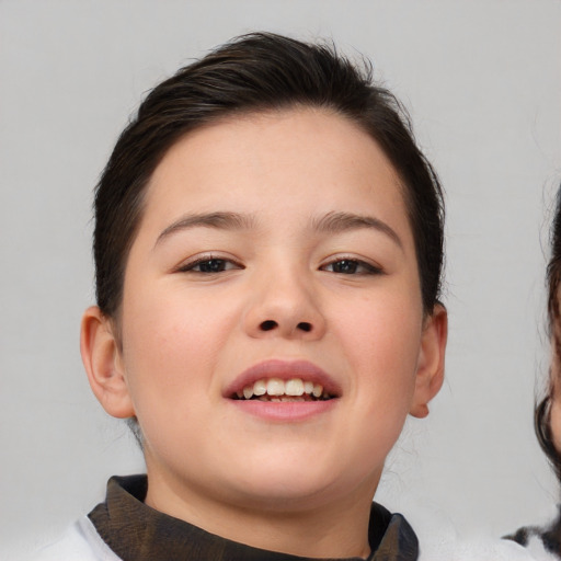 Joyful white child female with medium  brown hair and brown eyes