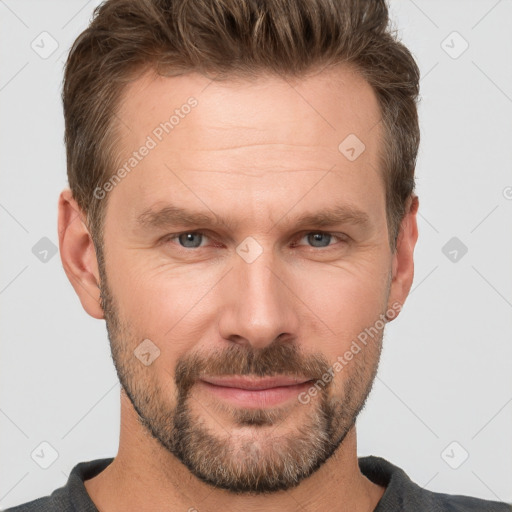 Joyful white adult male with short  brown hair and grey eyes