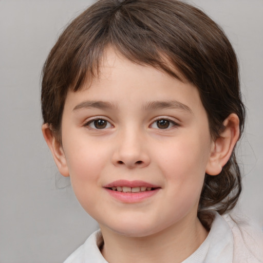 Joyful white child female with medium  brown hair and brown eyes