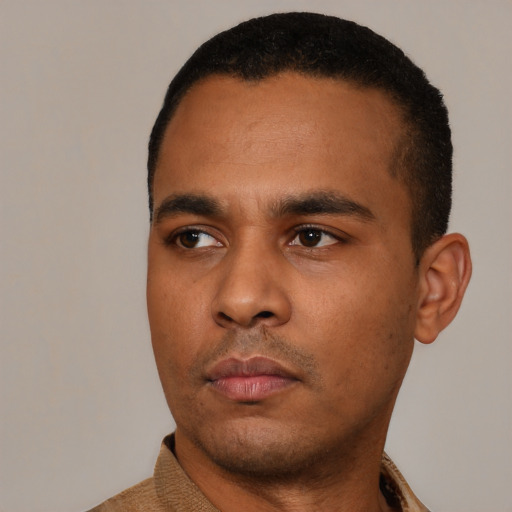 Neutral latino young-adult male with short  black hair and brown eyes