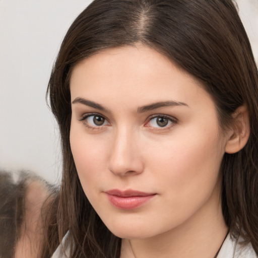 Neutral white young-adult female with medium  brown hair and brown eyes