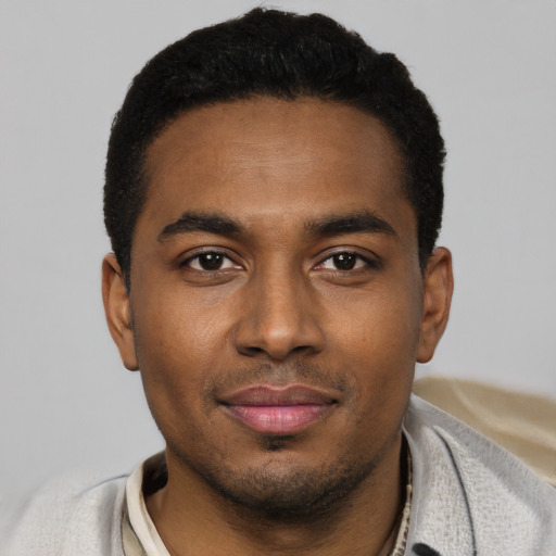 Neutral black young-adult male with short  black hair and brown eyes