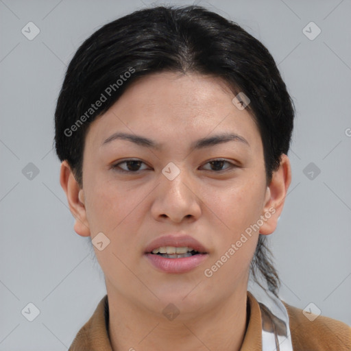 Joyful asian young-adult female with short  brown hair and brown eyes
