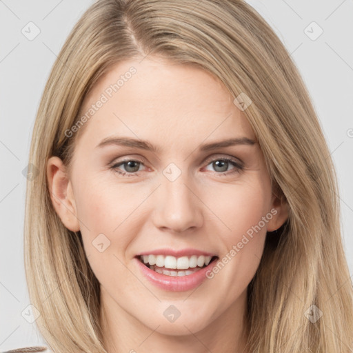 Joyful white young-adult female with long  brown hair and grey eyes