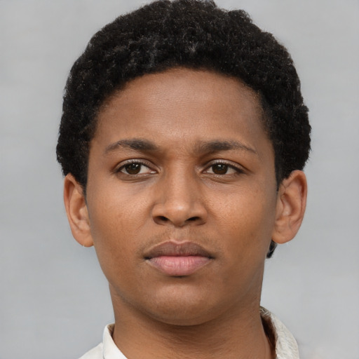 Neutral latino young-adult male with short  brown hair and brown eyes