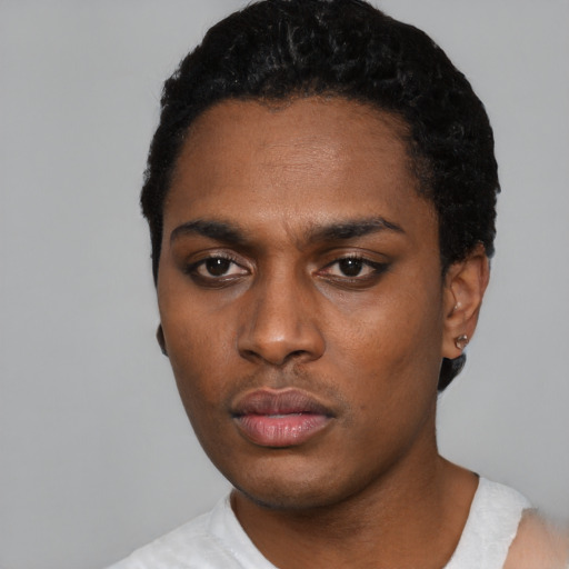 Neutral black young-adult male with short  black hair and brown eyes