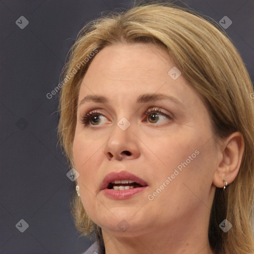 Joyful white adult female with medium  brown hair and brown eyes