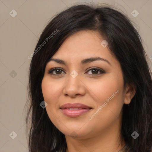 Joyful latino young-adult female with long  brown hair and brown eyes