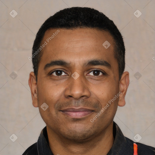 Joyful latino young-adult male with short  black hair and brown eyes