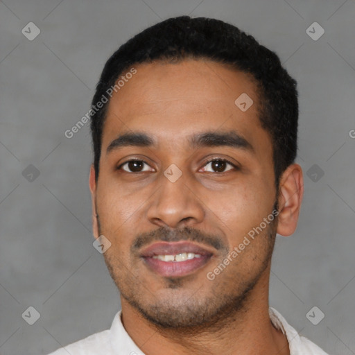 Joyful latino young-adult male with short  black hair and brown eyes