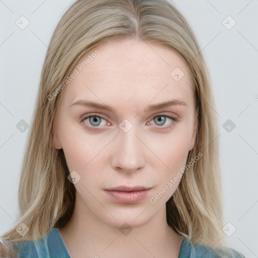 Neutral white young-adult female with long  brown hair and blue eyes