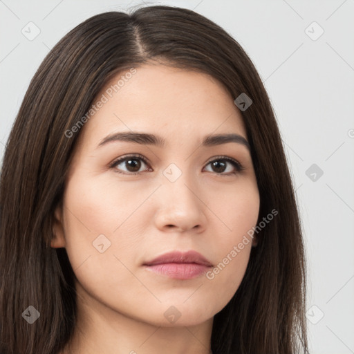 Neutral white young-adult female with long  brown hair and brown eyes