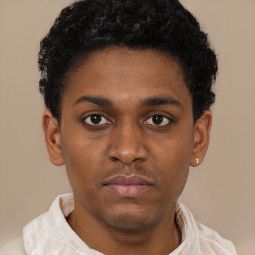Neutral latino young-adult male with short  brown hair and brown eyes