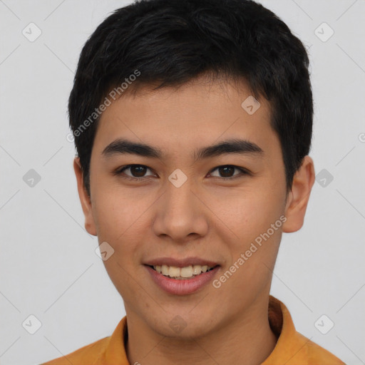 Joyful asian young-adult male with short  black hair and brown eyes