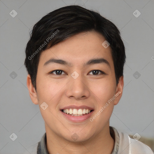 Joyful asian young-adult male with short  black hair and brown eyes