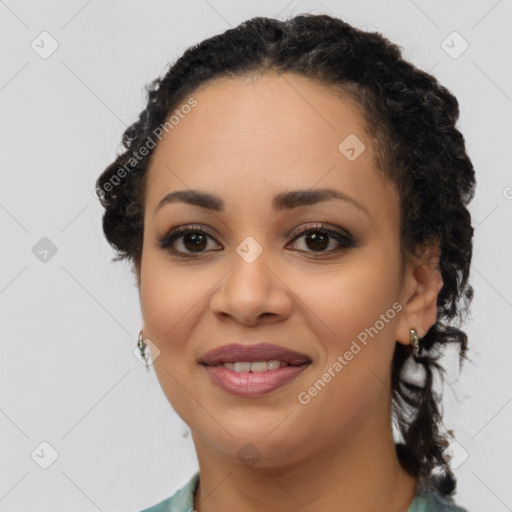 Joyful latino young-adult female with long  brown hair and brown eyes
