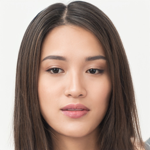 Neutral asian young-adult female with long  brown hair and brown eyes