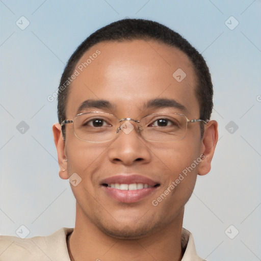 Joyful latino young-adult male with short  brown hair and brown eyes