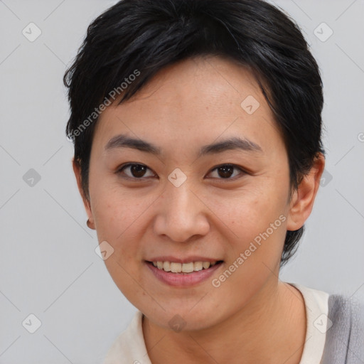 Joyful asian young-adult female with short  brown hair and brown eyes