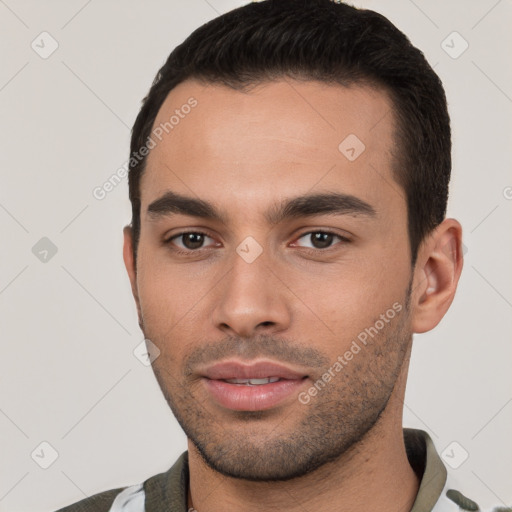 Neutral white young-adult male with short  black hair and brown eyes