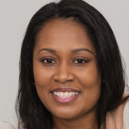 Joyful asian young-adult female with long  brown hair and brown eyes