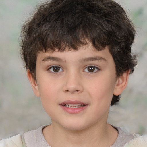 Joyful white child male with short  brown hair and brown eyes