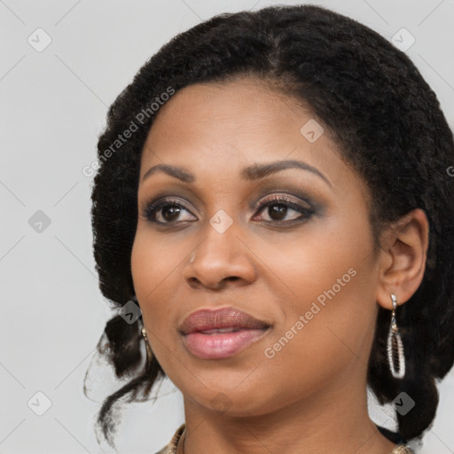 Joyful black young-adult female with medium  black hair and brown eyes