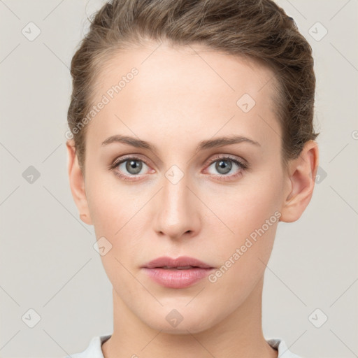 Neutral white young-adult female with short  brown hair and grey eyes