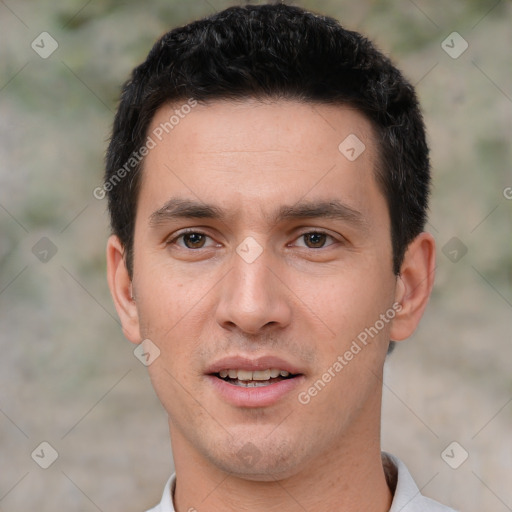 Joyful white young-adult male with short  black hair and brown eyes