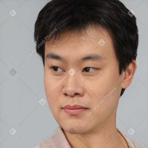 Neutral asian young-adult male with short  black hair and brown eyes
