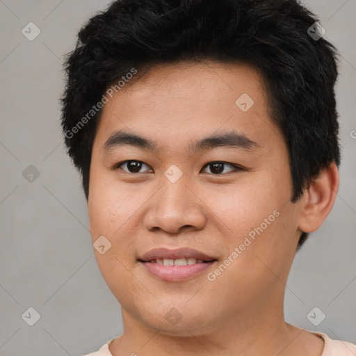 Joyful asian young-adult male with short  brown hair and brown eyes