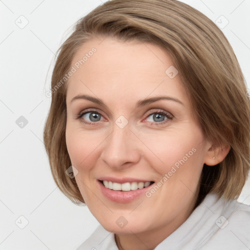 Joyful white young-adult female with medium  brown hair and blue eyes