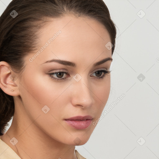 Neutral white young-adult female with medium  brown hair and brown eyes