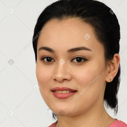 Joyful white young-adult female with medium  black hair and brown eyes