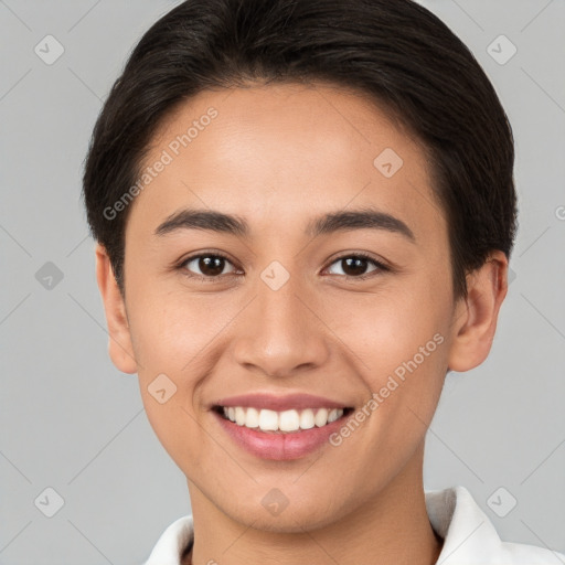 Joyful white young-adult female with short  brown hair and brown eyes