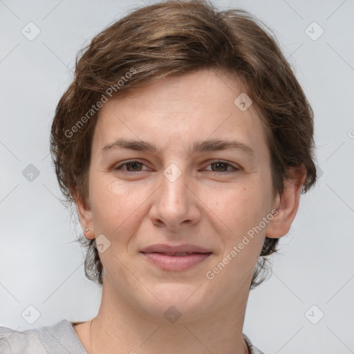 Joyful white young-adult female with short  brown hair and grey eyes