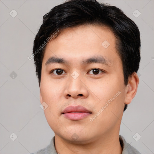 Neutral asian young-adult male with short  black hair and brown eyes